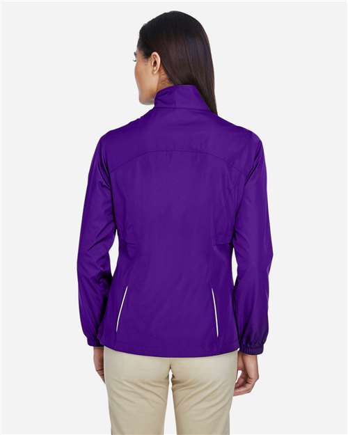 Women's Techno Lite Motivate Unlined Lightweight Jacket - OnModelBack - B209A7677 - Campus Purple