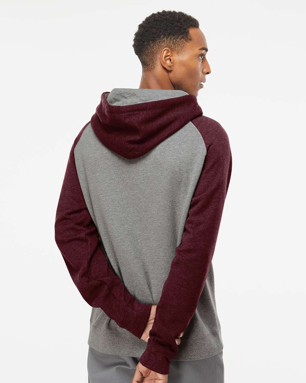 Unisex Raglan Hooded Sweatshirt - OnModelBack - B82976522 - Gunmetal Heather/ Burgundy Heather
